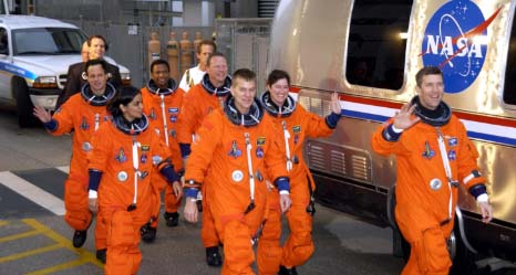 STS-107 Crew Heads to the Astrovan