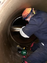 bynum-larry-working-on-butterfly-valve-seal