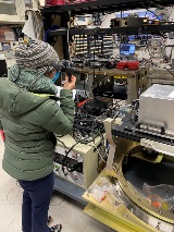 Thuquynh Dinh, PI3E JV LLP contractor at Goddard Space Flight Center, is using an Infrared View Finder to verify that the laser beam's path for a Class 4 laser system associated with the Mars Lidar brass b