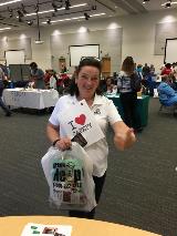 Langley Research Center Employee Linda Brewer shows her love of safety at the Safety Culture booth.