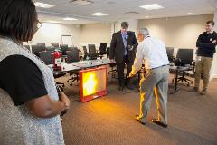 NASA Employee Ken Hodgdon takes time out of his busy schedule to take the Fire Extinguisher Training at NASA Headquarters.