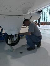 Glenn Research Center Employee Tom Thompson discovered an improperly annotated maintenance procedure which resulted in T-34 wheel assemblies to be mounted to the aircraft unsafely. 