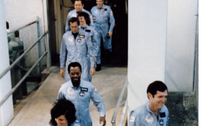 Challenger Crew Walk Through Doors of O&C Building